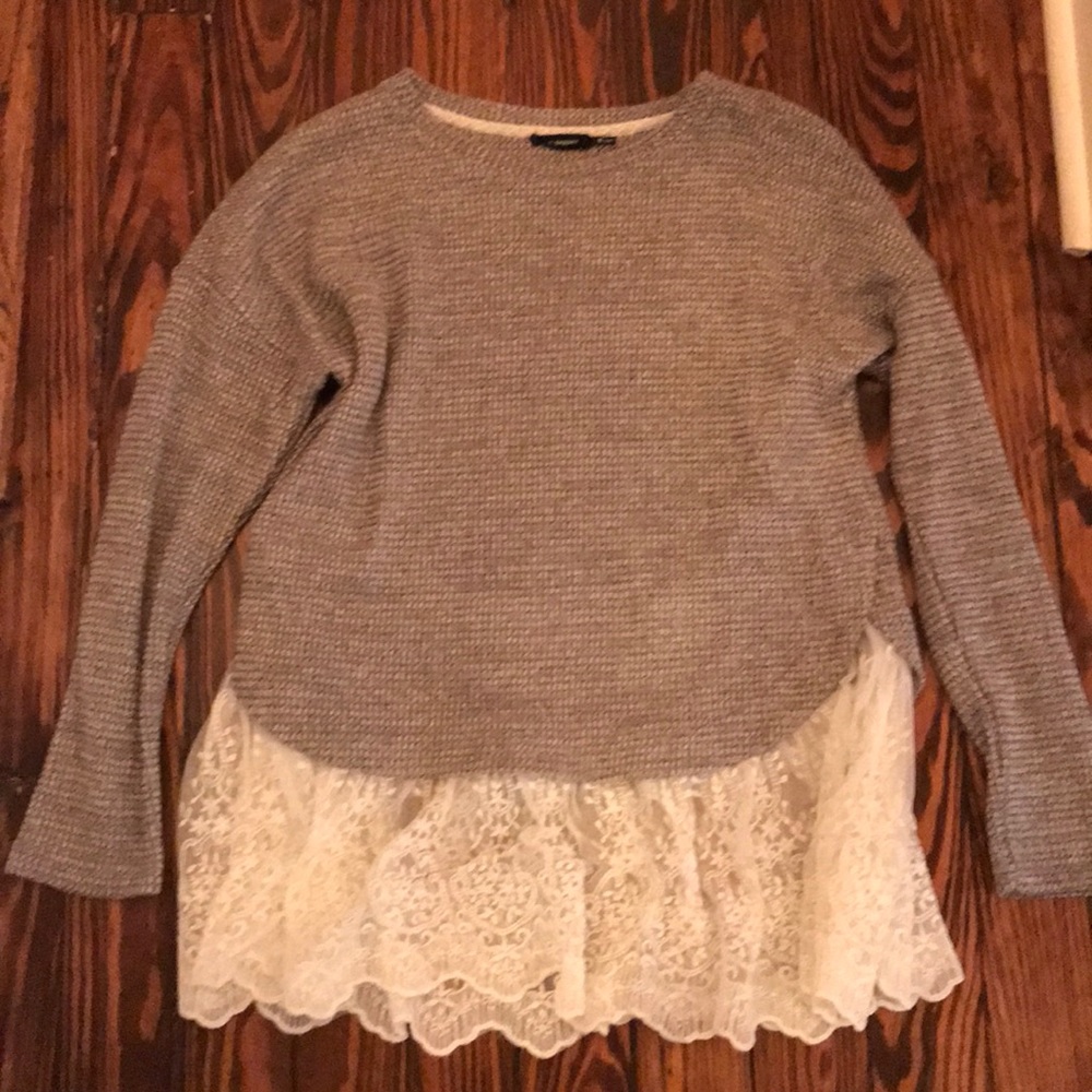 Gray knit sweater with lace trim